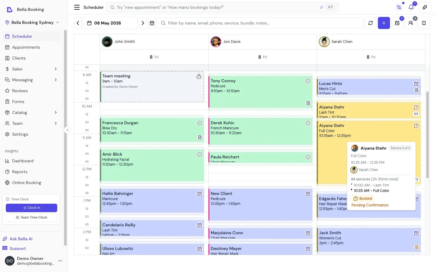 Scheduler day view showing appointments across team members