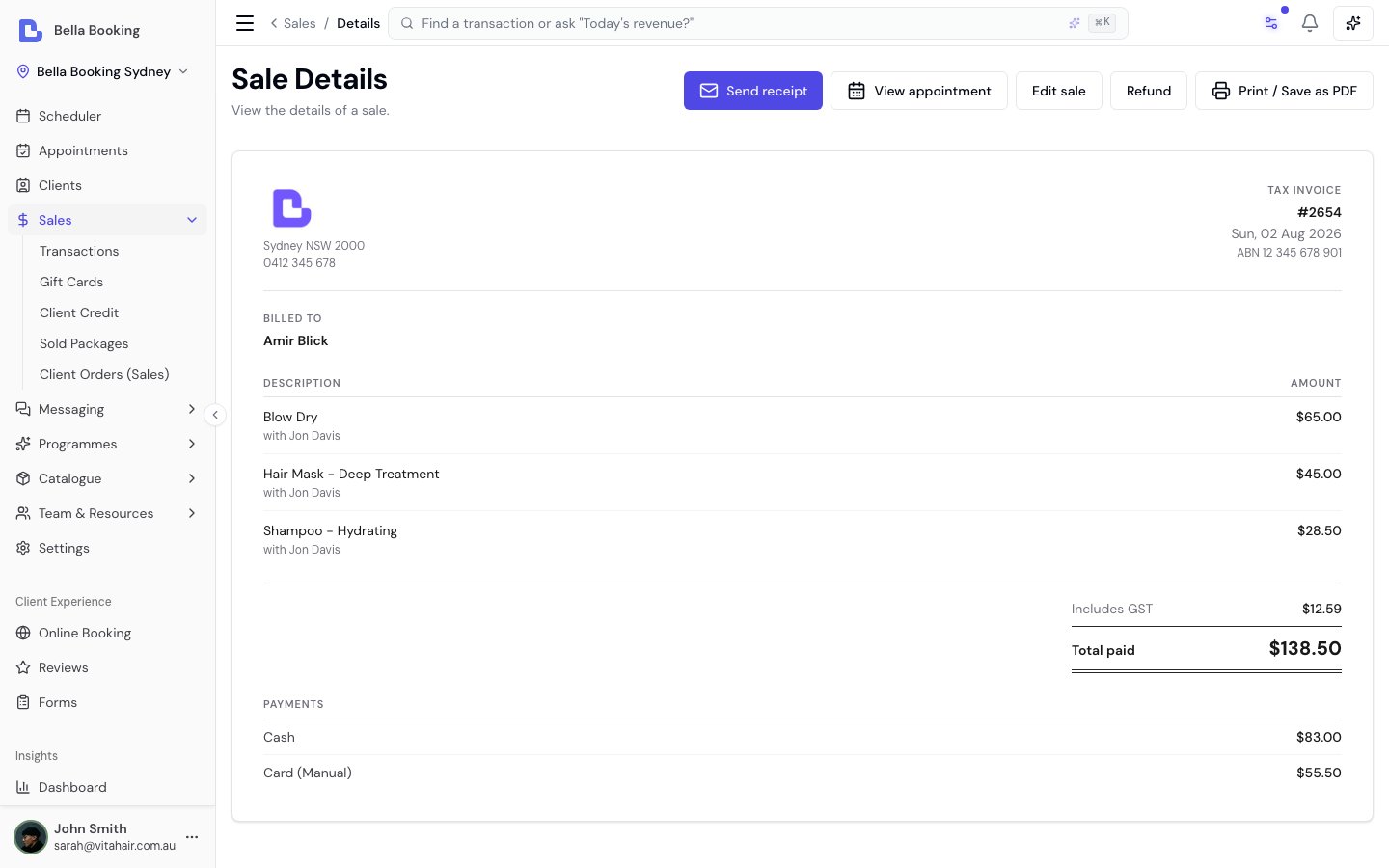 Tax invoice showing itemised services with the team member, tax registration number, ruled totals, and each payment taken