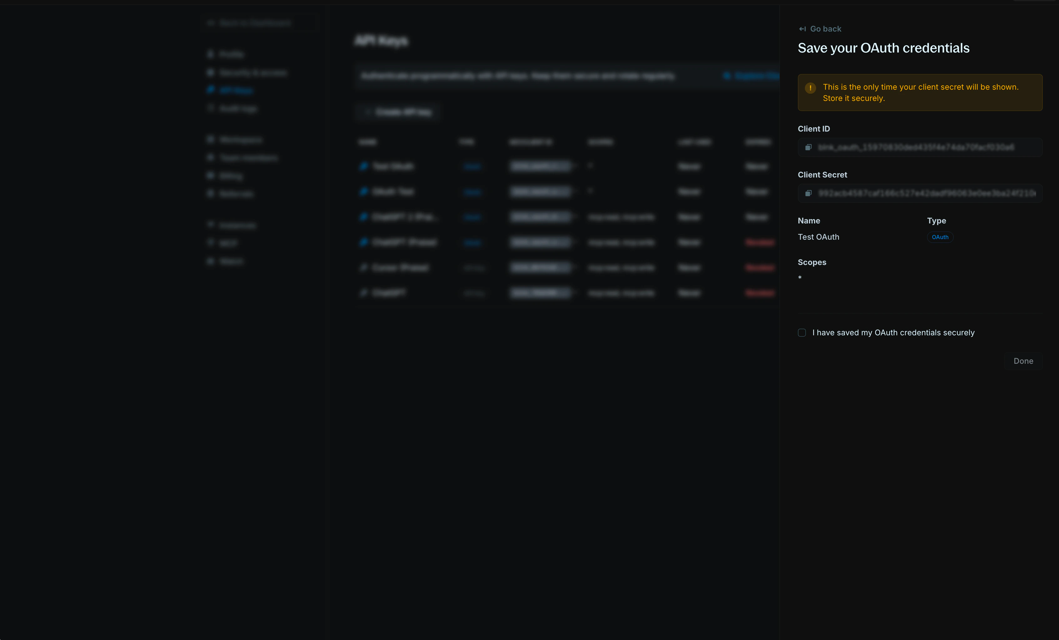 OAuth credentials panel showing Client ID, Client Secret, and warning to store credentials securely