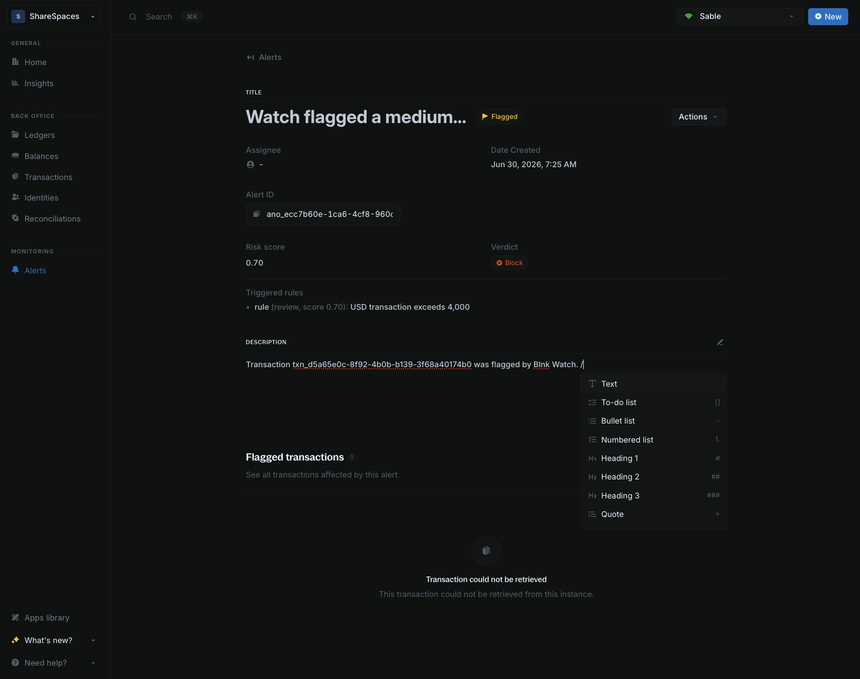 Alert description with the slash command menu open