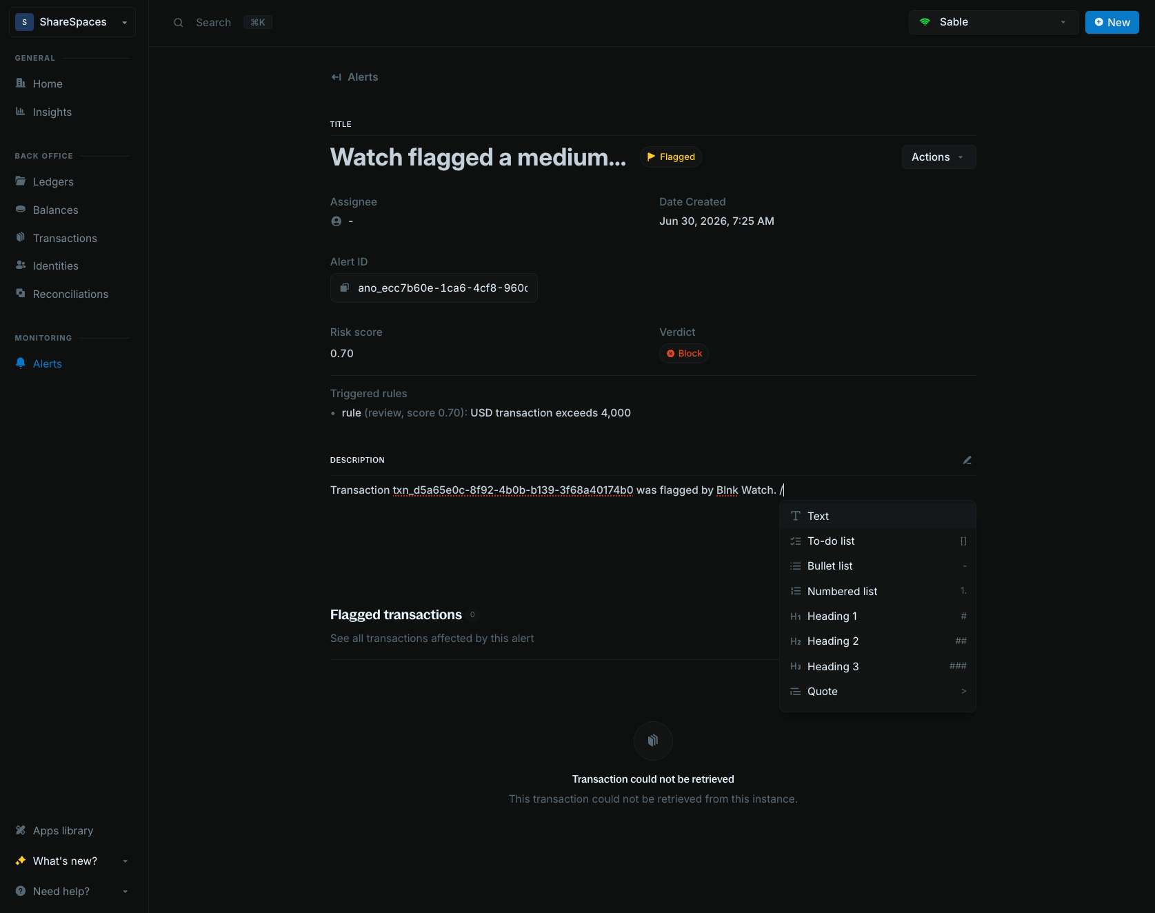 Alert description with the slash command menu open