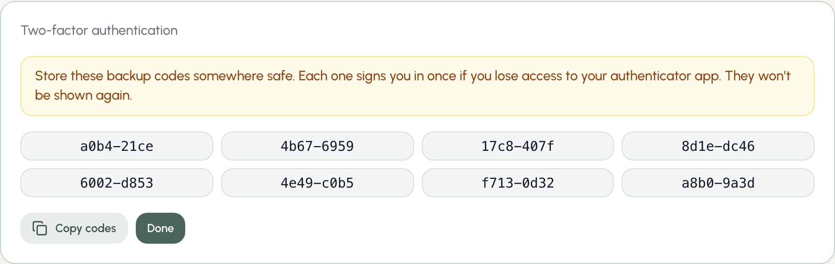 Backup codes shown once after enabling two-factor authentication