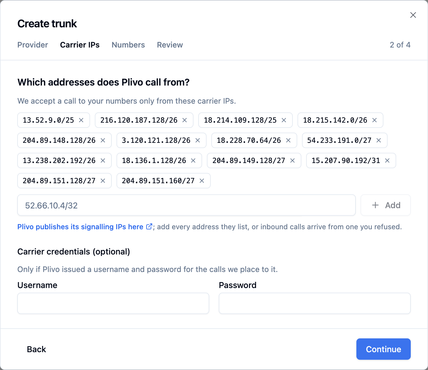 Create trunk dialog on the Carrier IPs step, showing Plivo's prefilled signalling CIDR ranges as removable chips, an address input with an Add button, and empty Username and Password fields under Carrier credentials (optional)