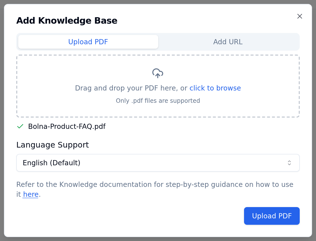 Add Knowledge Base modal with the Upload PDF tab active, a drag and drop area noting only .pdf files are supported, a selected file with a green check, a Language Support dropdown set to English (Default) and an Upload PDF button