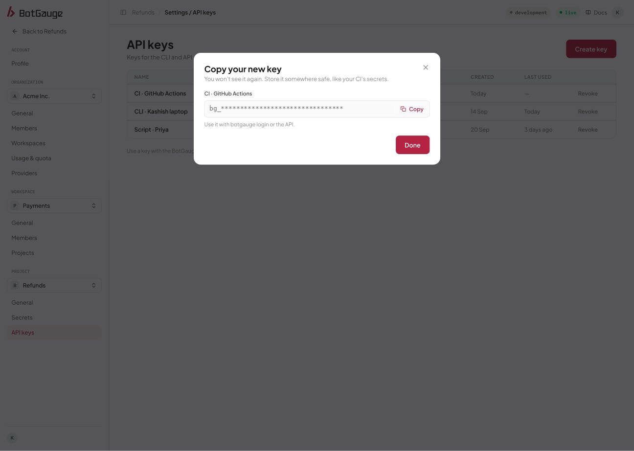 The Copy your new key dialog showing the key once with a Copy button
