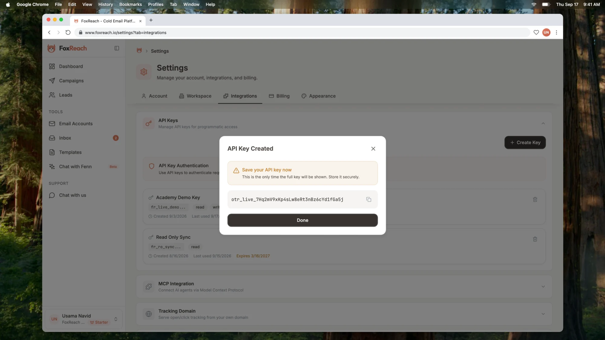 The API Key Created dialog in FoxReach showing the full HubSpot sync key once, with the copy button and the warning that it will not be shown again