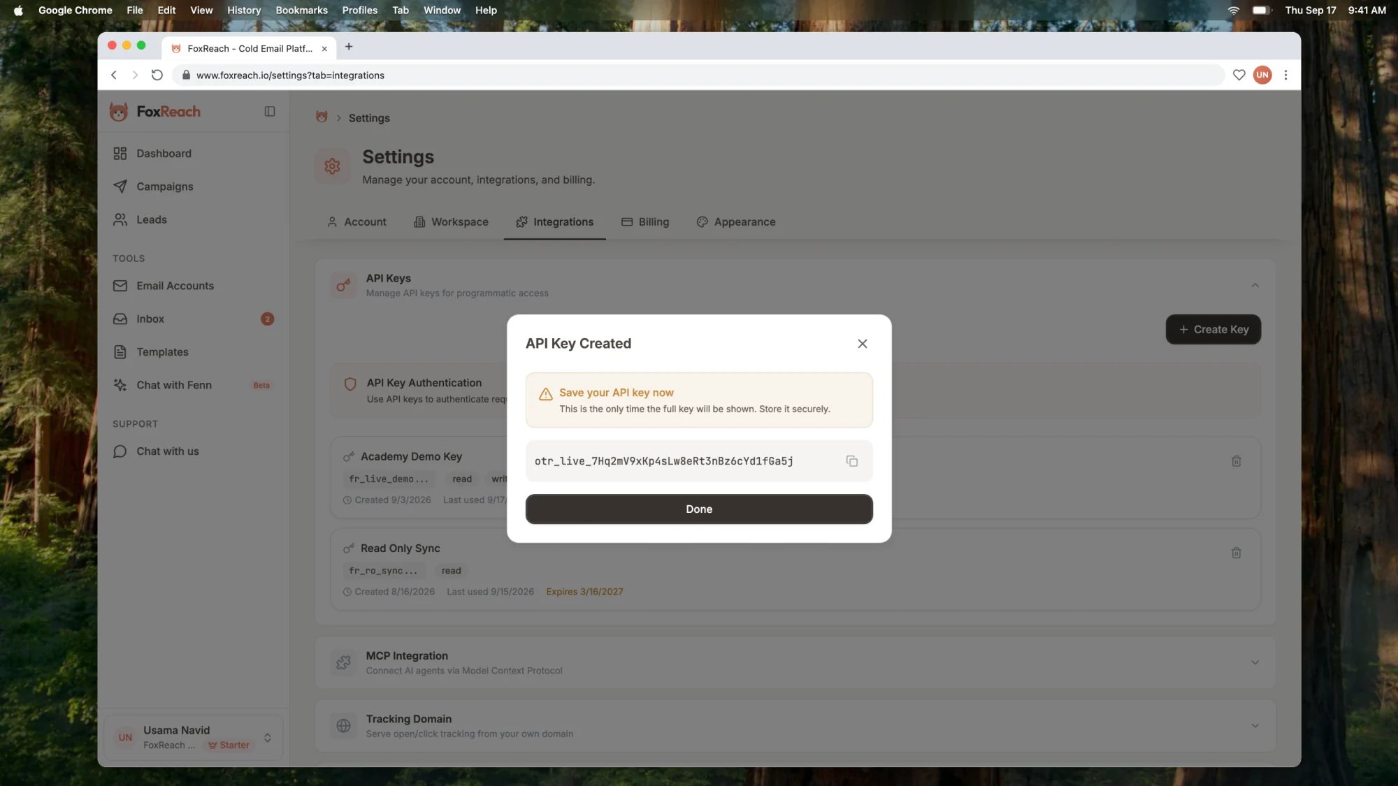 The API Key Created dialog in FoxReach showing the full HubSpot sync key once, with the copy button and the warning that it will not be shown again