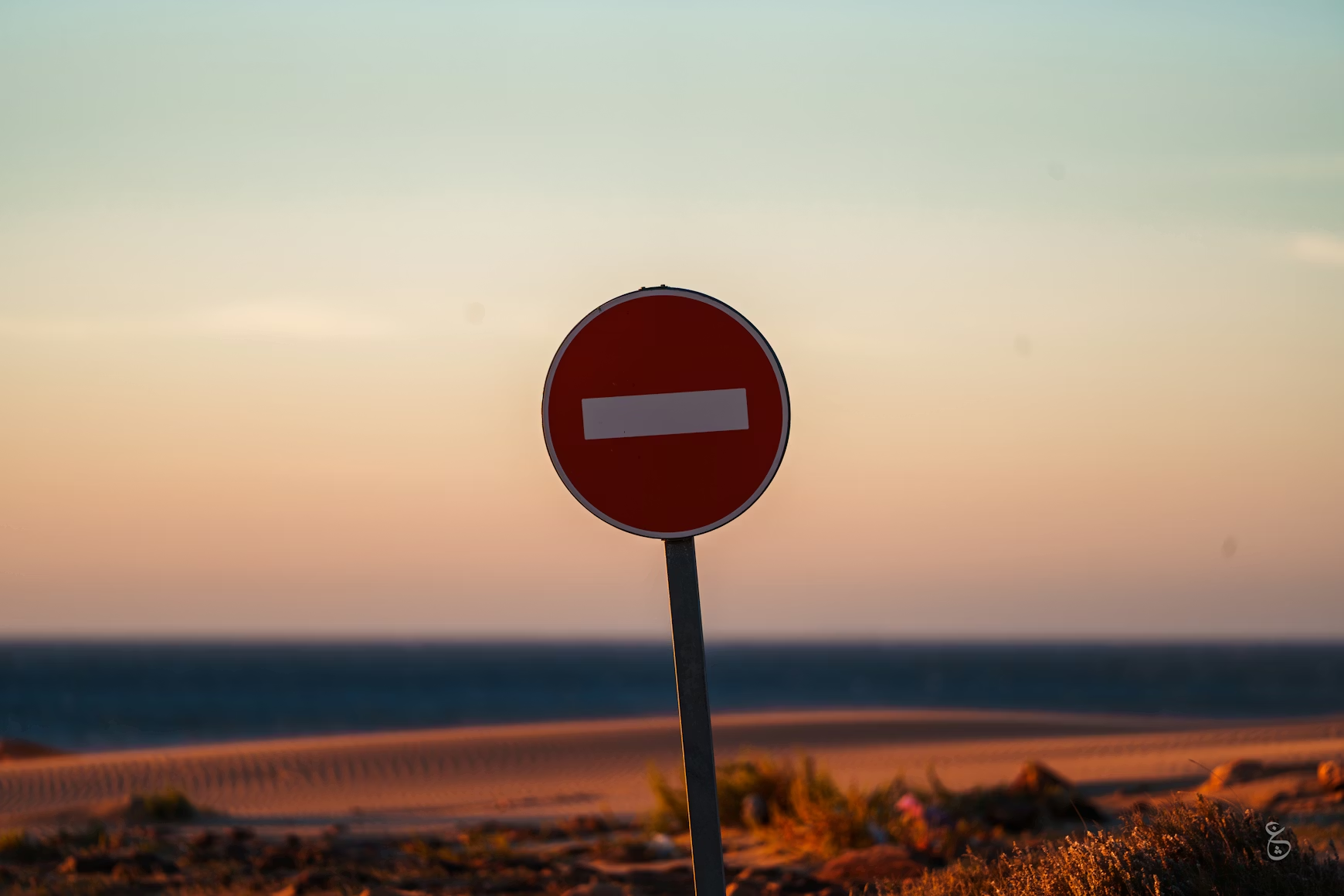 Stop sign on a beach - banned hashtags can stop your reach
