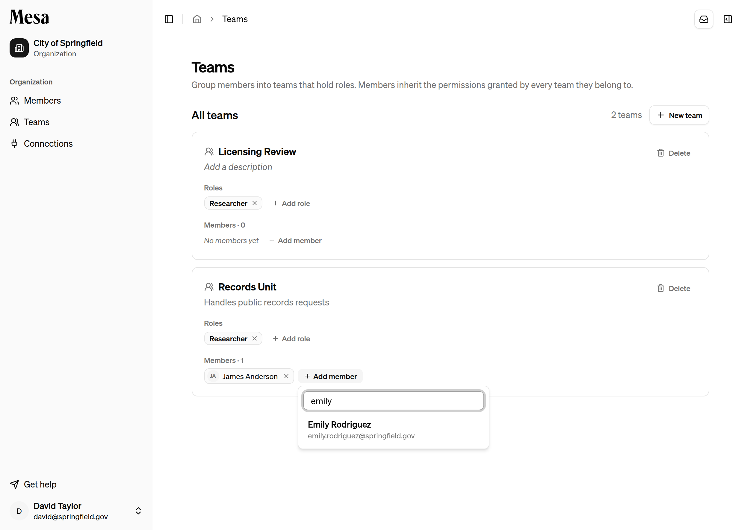 Adding a member to a team from the card's inline search