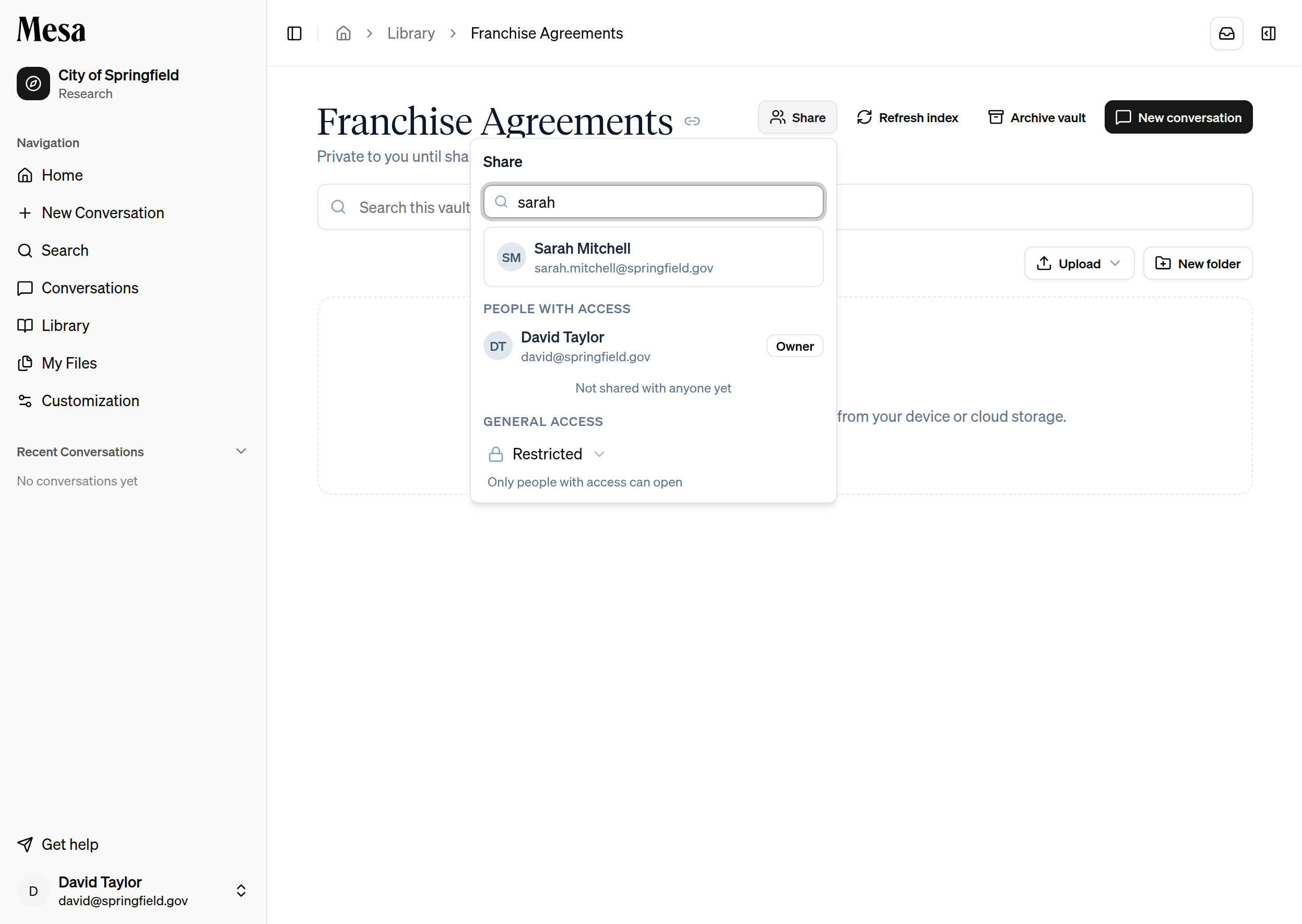 The share popover on a vault, searching for a member to add