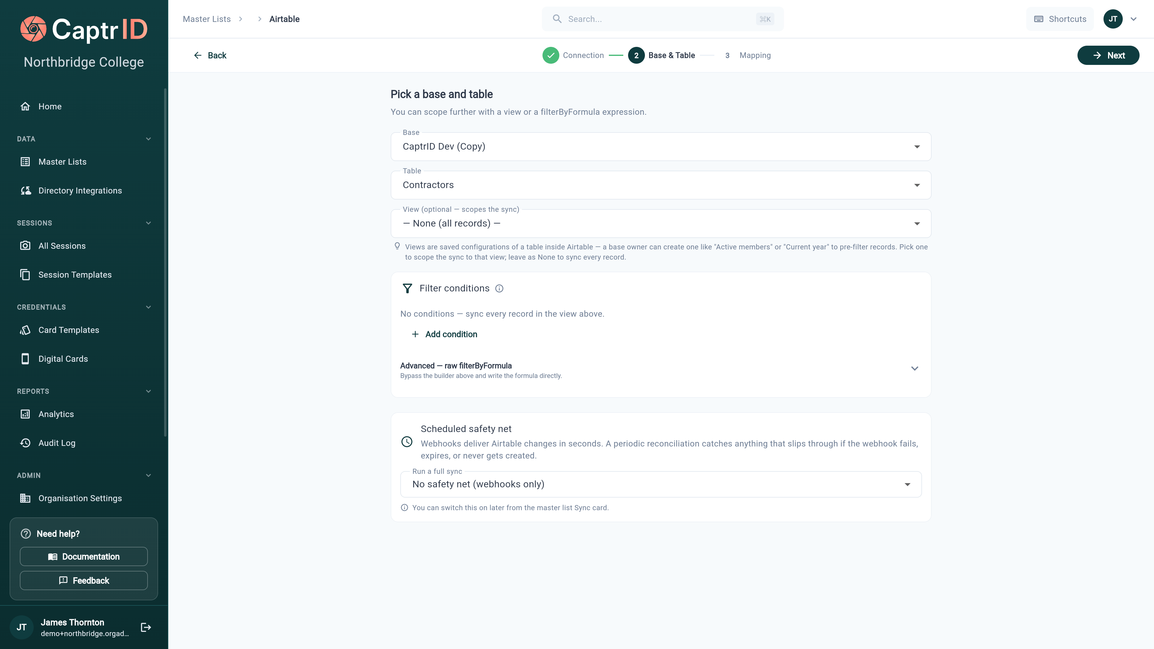 Airtable sync wizard showing base and table dropdowns, an optional view selector, a filter condition builder, and the scheduled safety net option