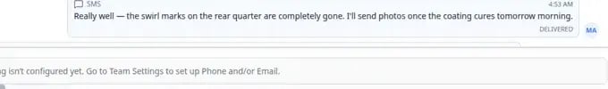 Inbox timeline showing an outbound text message with a delivered status label beneath the message bubble