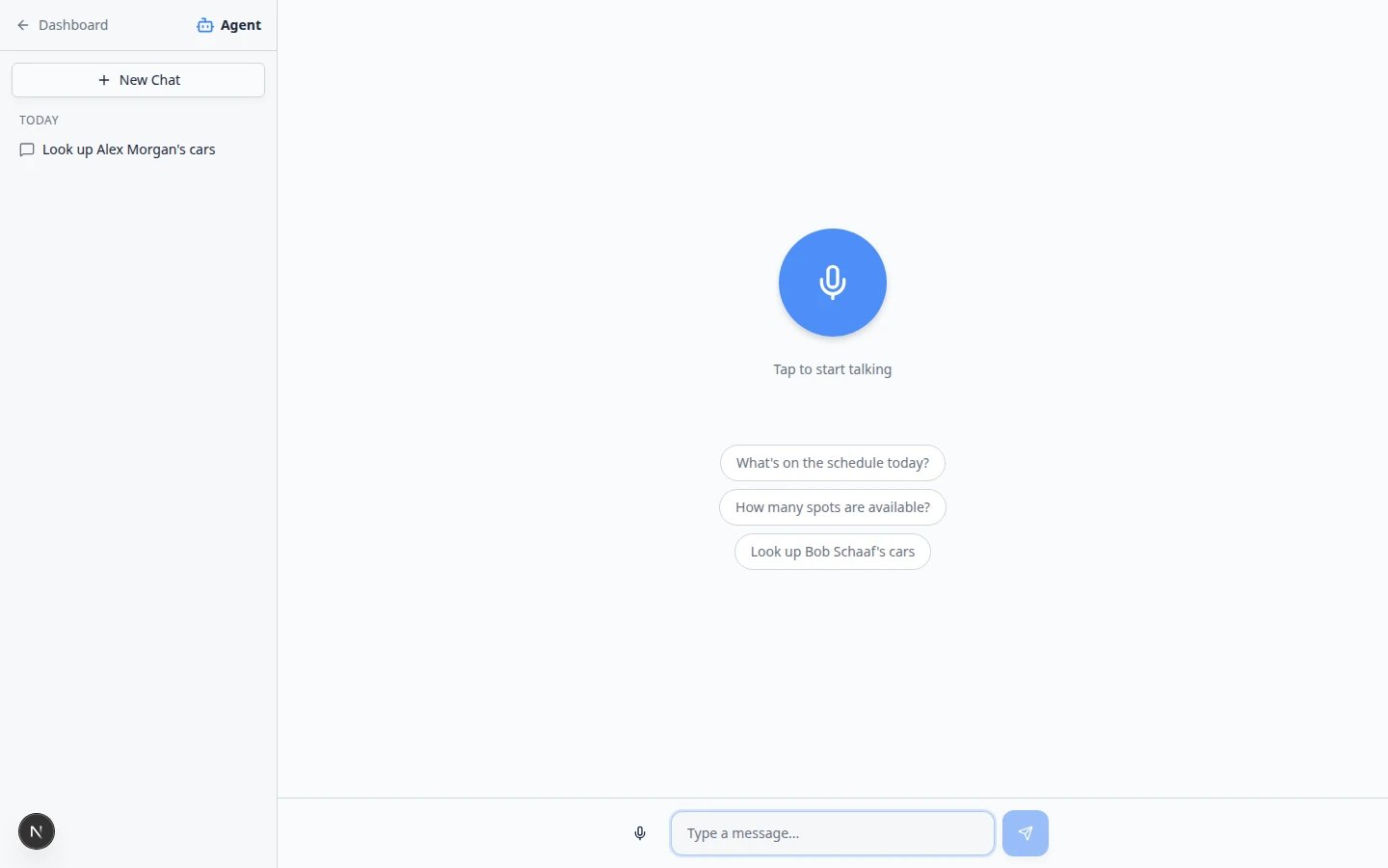 AI Assistant start screen showing the microphone orb, suggestion chips, and Type a message field at the bottom