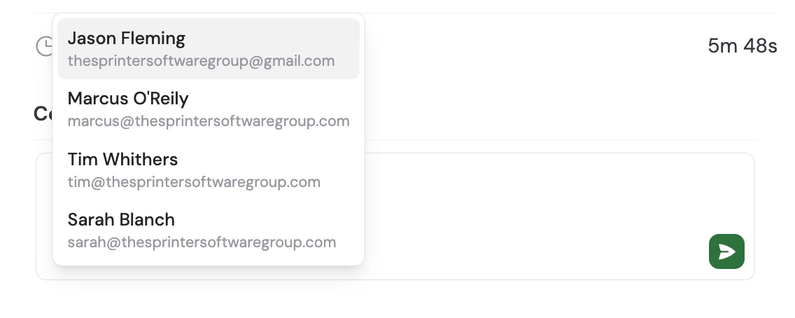 Comment input showing the @-mention autocomplete dropdown with team member names