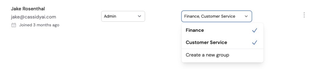 Team member row showing role and group assignment dropdowns