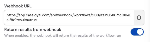 Webhook trigger settings with Return results and Require API Key options