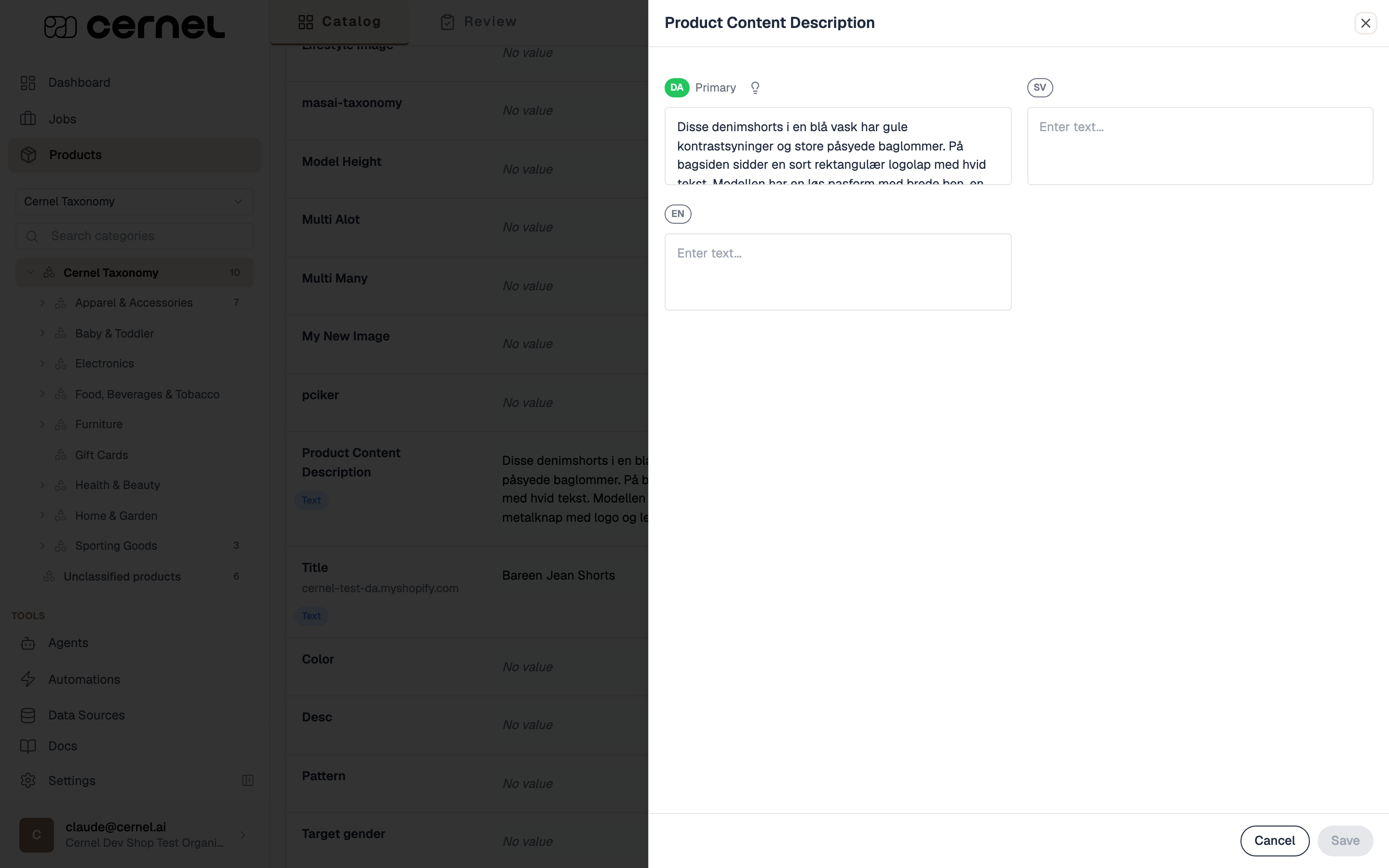 The Edit translations panel for the Product Content Description attribute, with the primary language marked and a value editor for each enabled language side by side, and Save and Cancel buttons