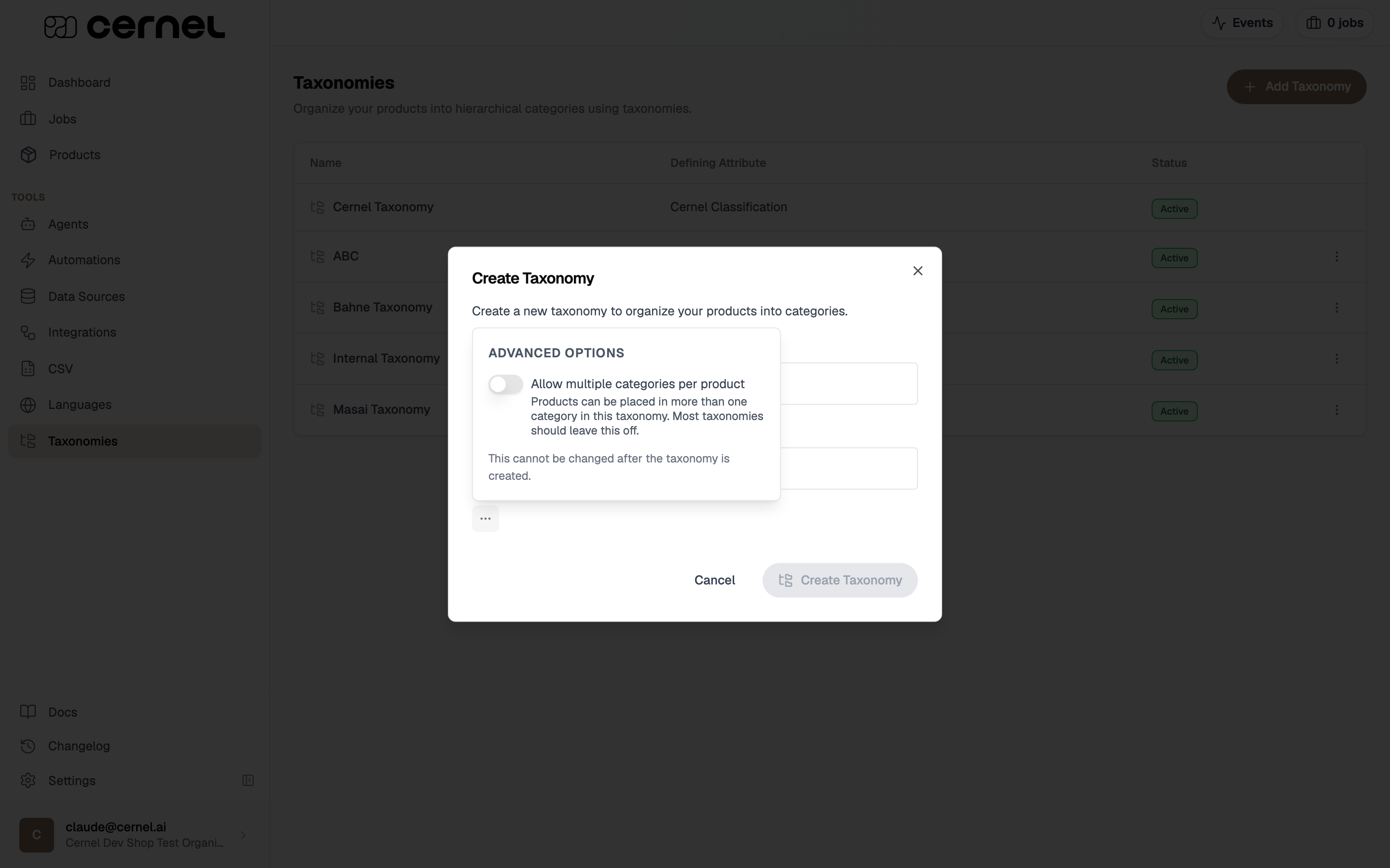 The Create Taxonomy dialog with its Advanced Options open, showing an 'Allow multiple categories per product' toggle turned off, its description, and a note that this cannot be changed after the taxonomy is created