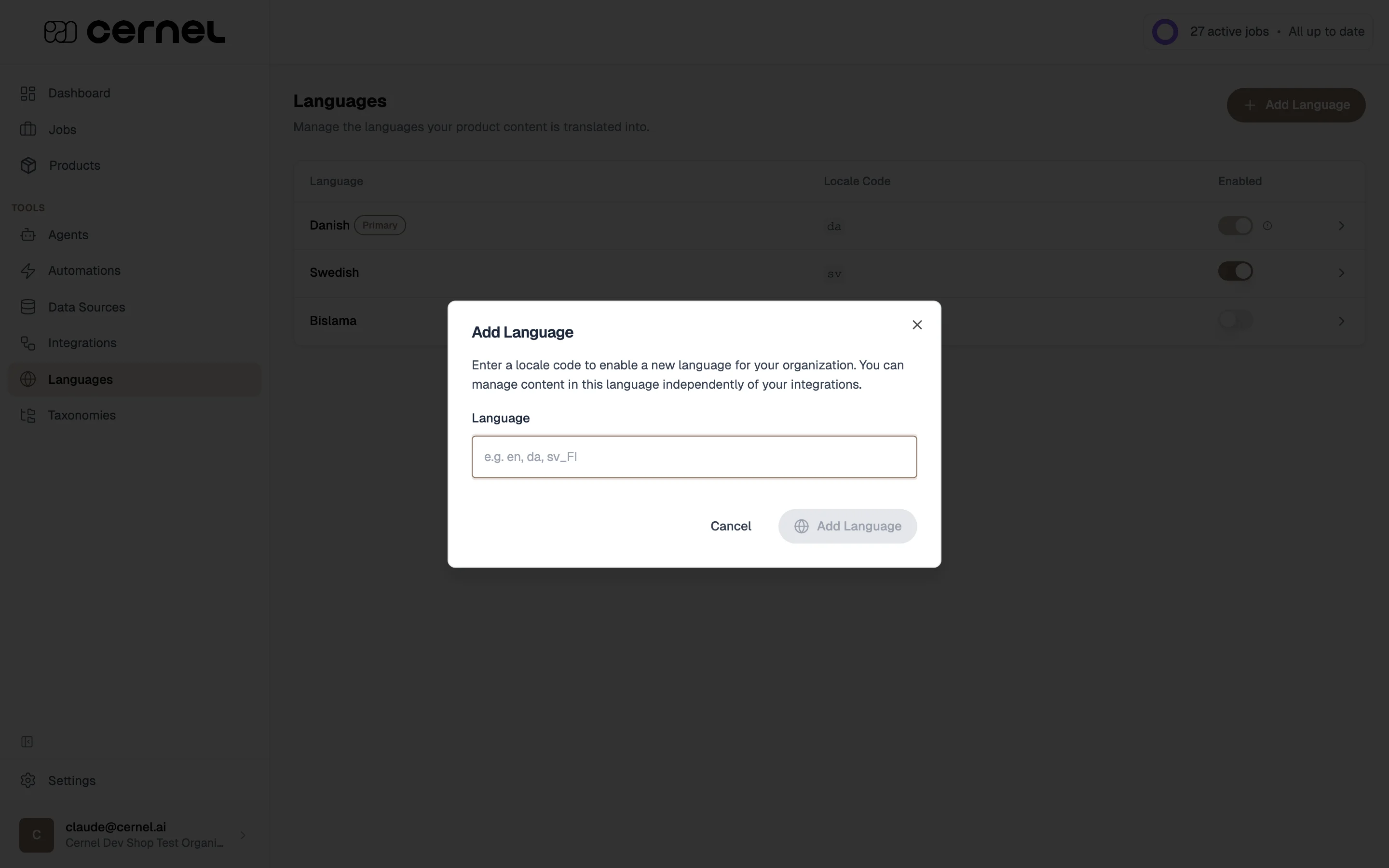 The Add Language modal with a free-text Language field and placeholder e.g. en, da, sv_FI