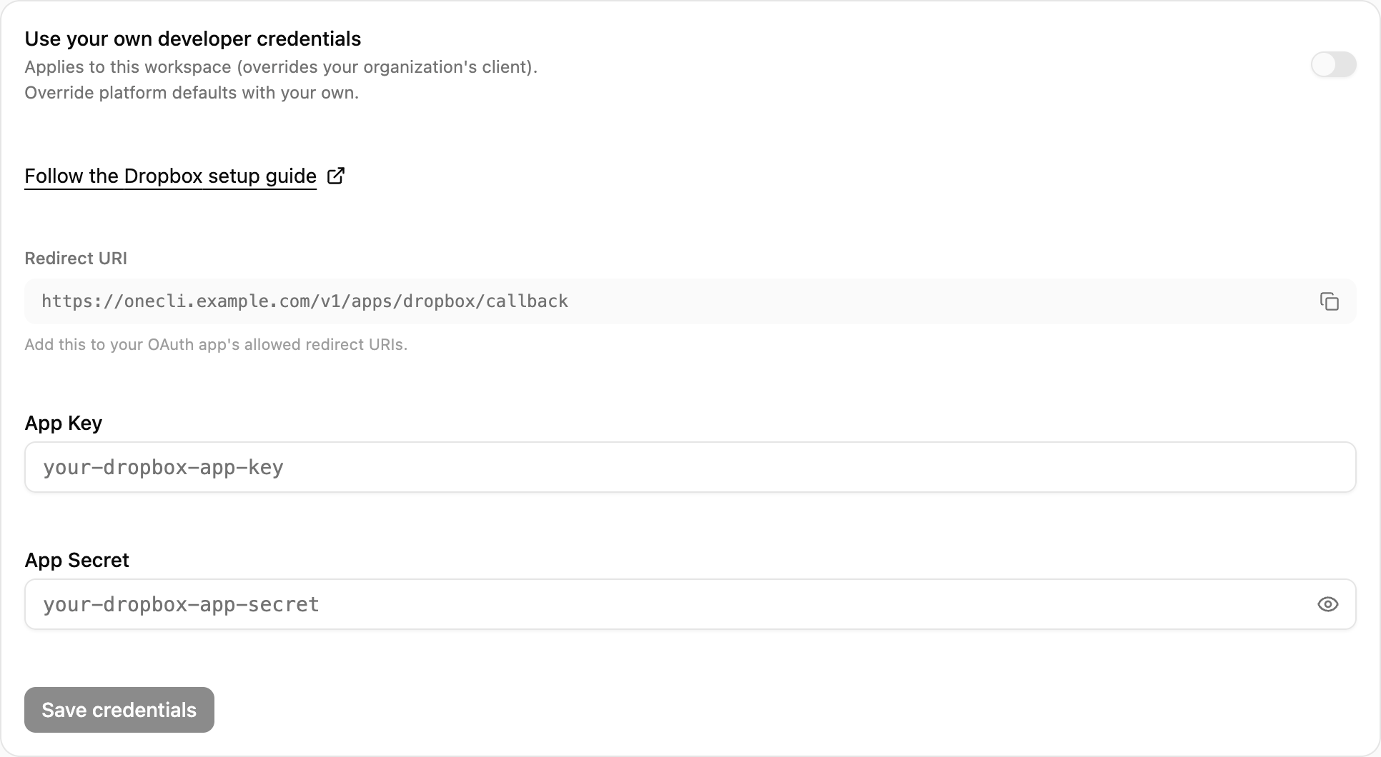 OneCLI Custom credentials card for Dropbox with the setup guide link, the Redirect URI and its copy button, and the client ID and secret fields.