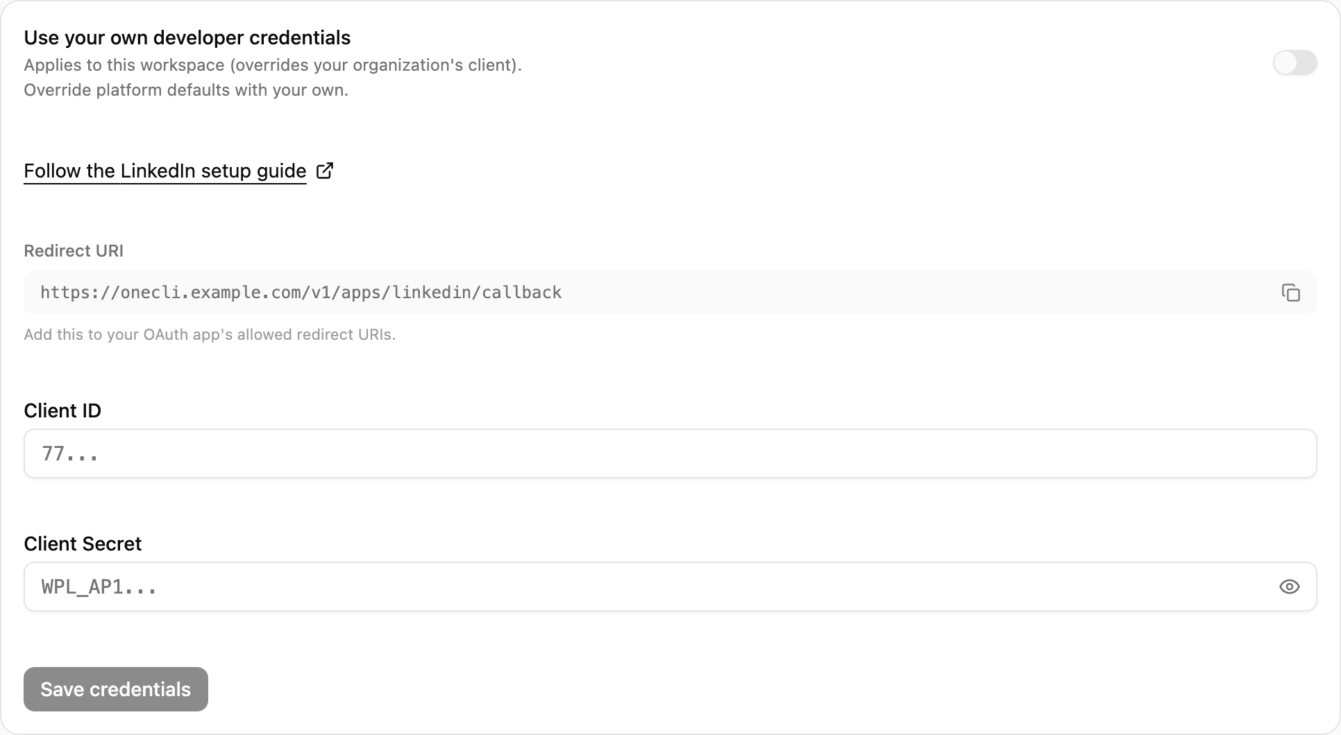 OneCLI Custom credentials card for LinkedIn with the setup guide link, the Redirect URI and its copy button, and the client ID and secret fields.