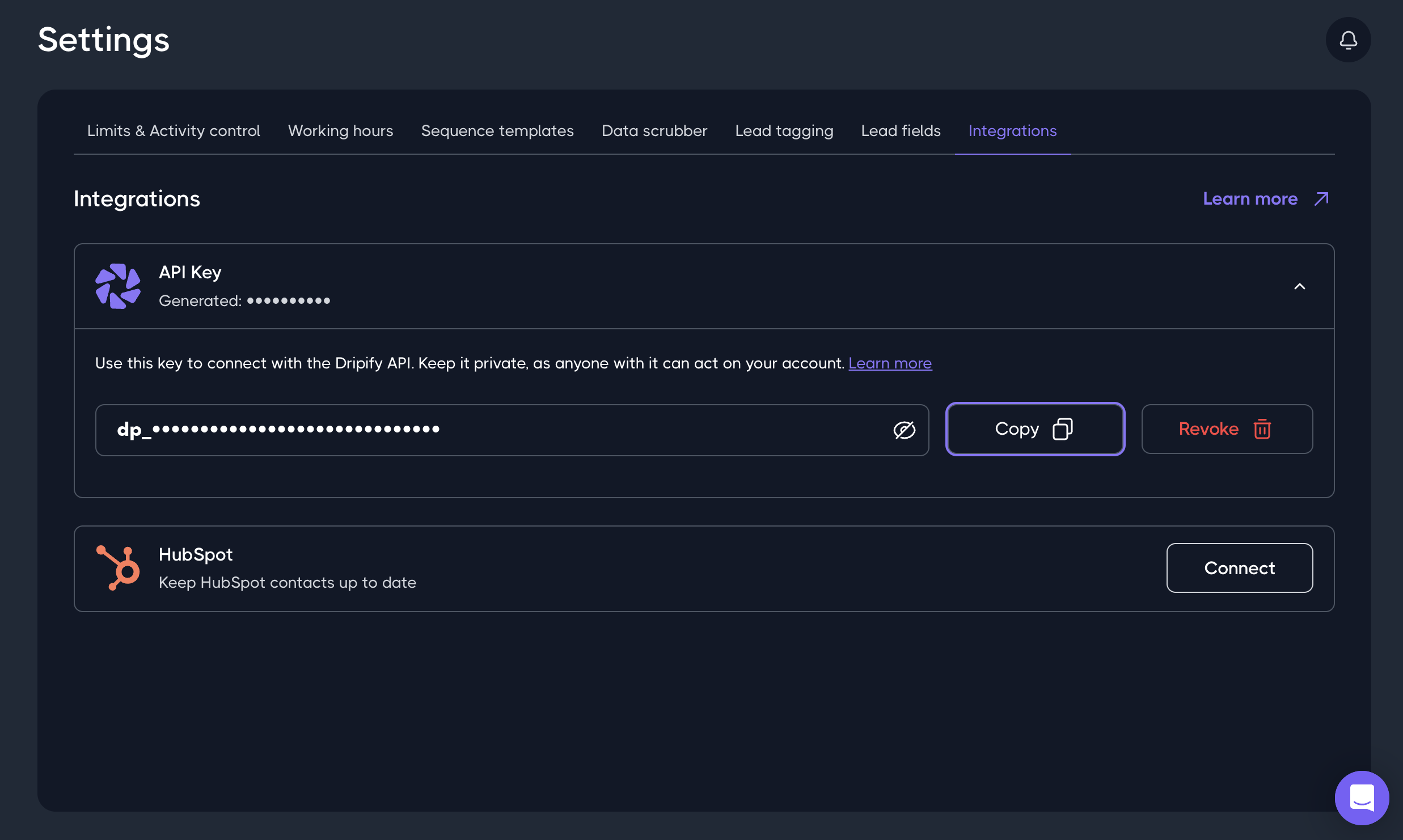 Dripify Settings, Integrations tab, showing the API Key block with a masked key and the Copy and Revoke buttons.