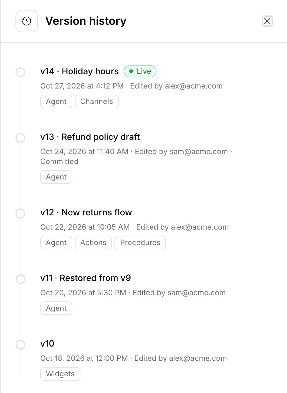 The Version history panel listing versions 14 to 10, with version 14 marked Live and version 13 marked Committed