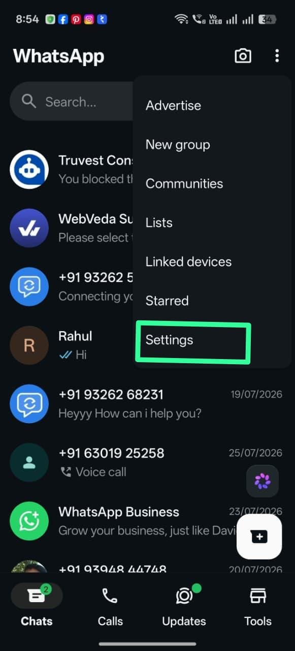 WhatsApp Business app main menu open with Settings highlighted