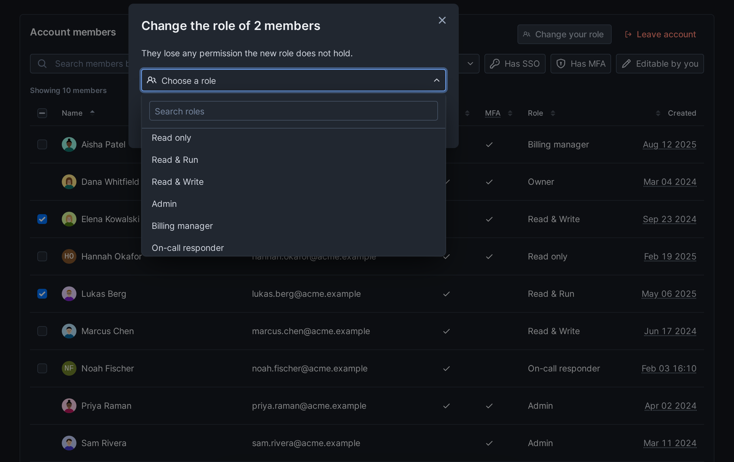 The Change role dialog with the role picker open, listing the built-in roles and then the custom roles Billing manager and On-call responder
