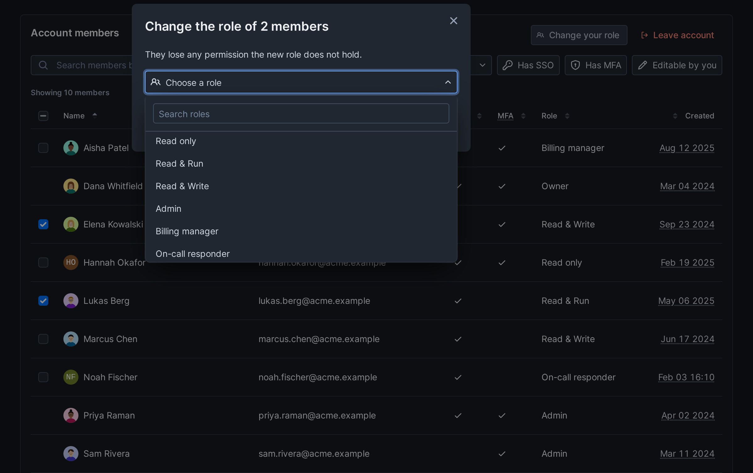 The Change role dialog with the role picker open, listing the built-in roles and then the custom roles Billing manager and On-call responder