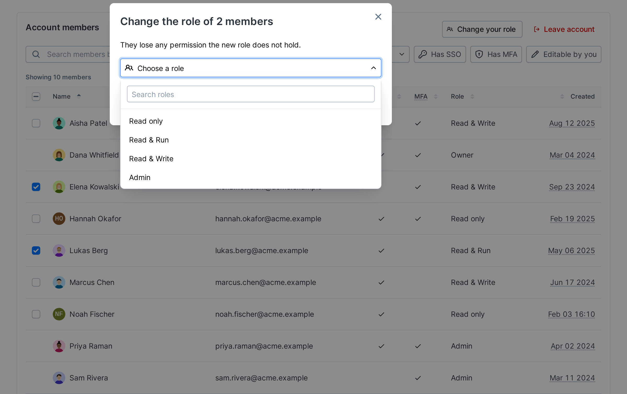 The Change role dialog with the role picker open, listing the roles below a search field