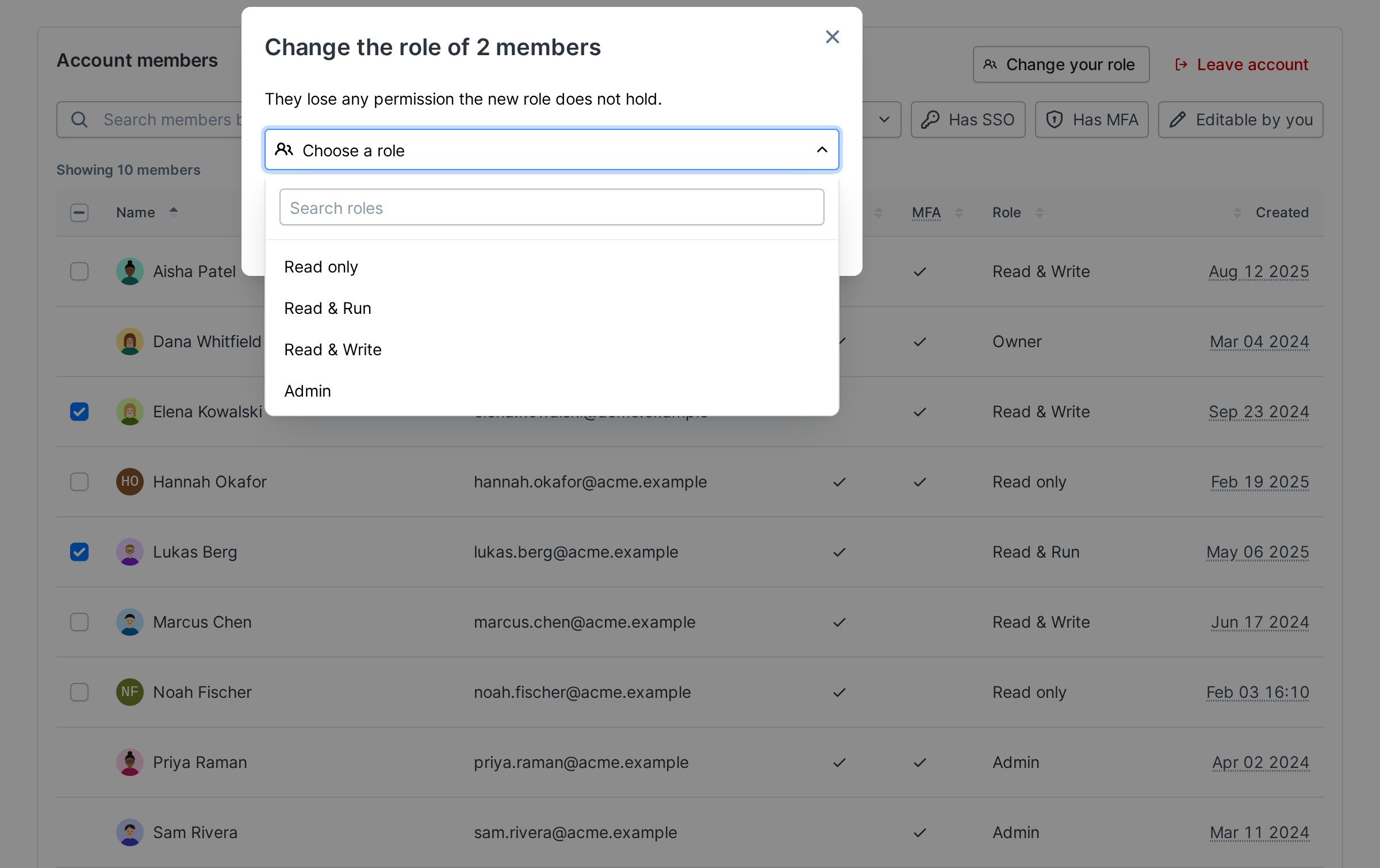 The Change role dialog with the role picker open, listing the roles below a search field