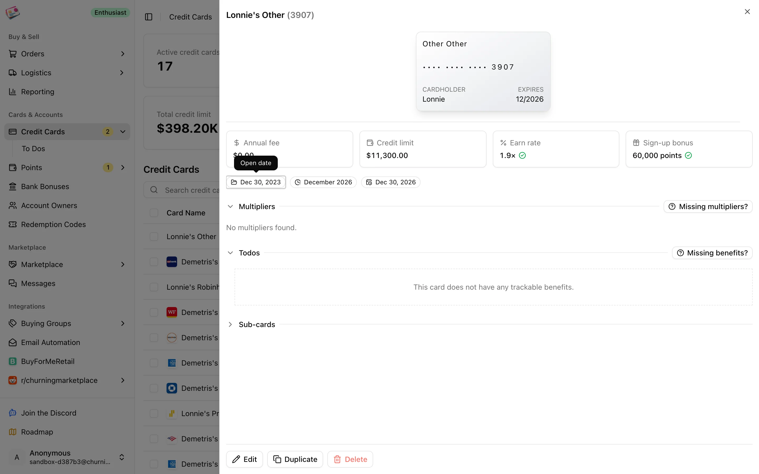 A credit card's detail panel with tiles, multipliers, and benefits