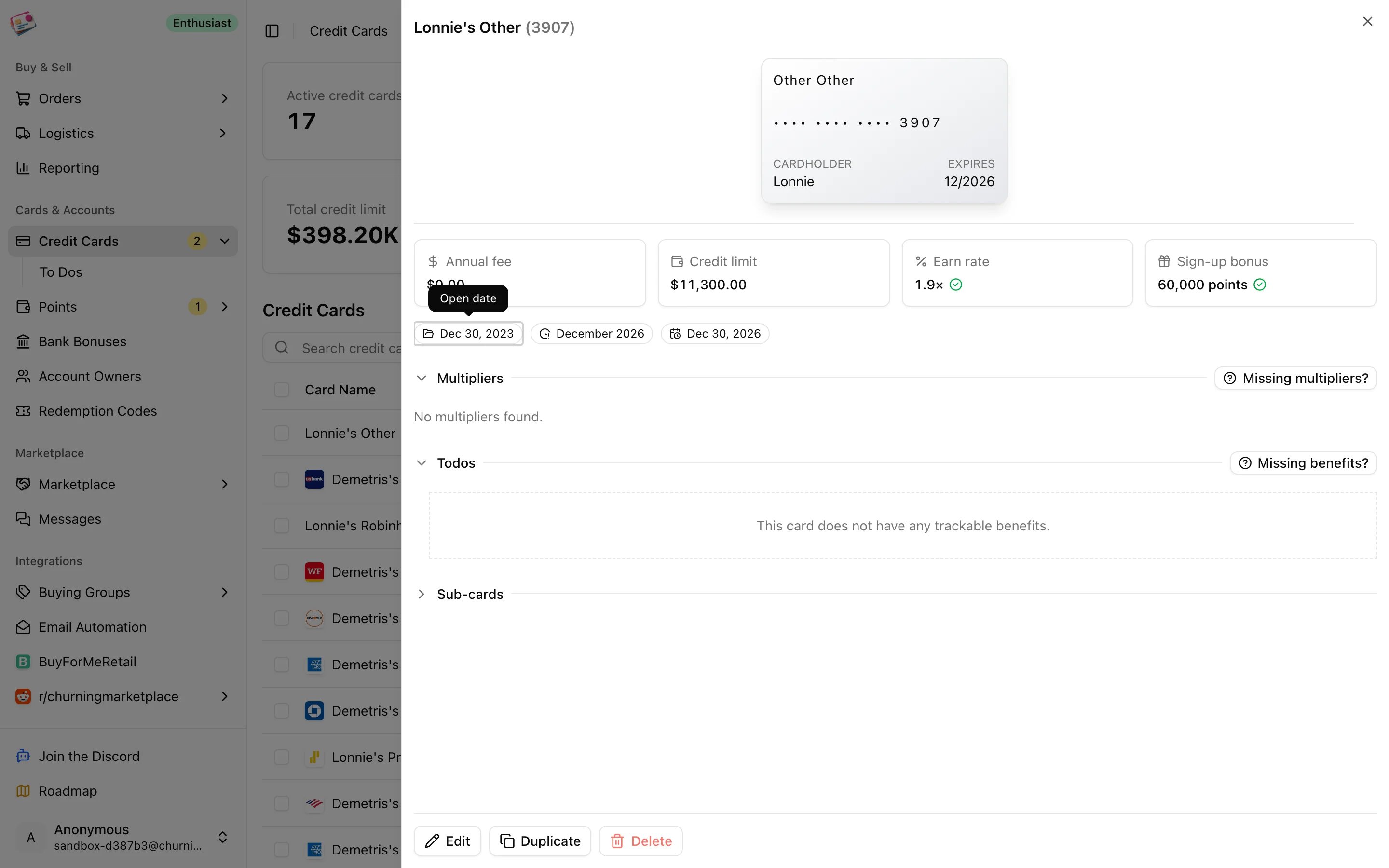A credit card's detail panel with tiles, multipliers, and benefits