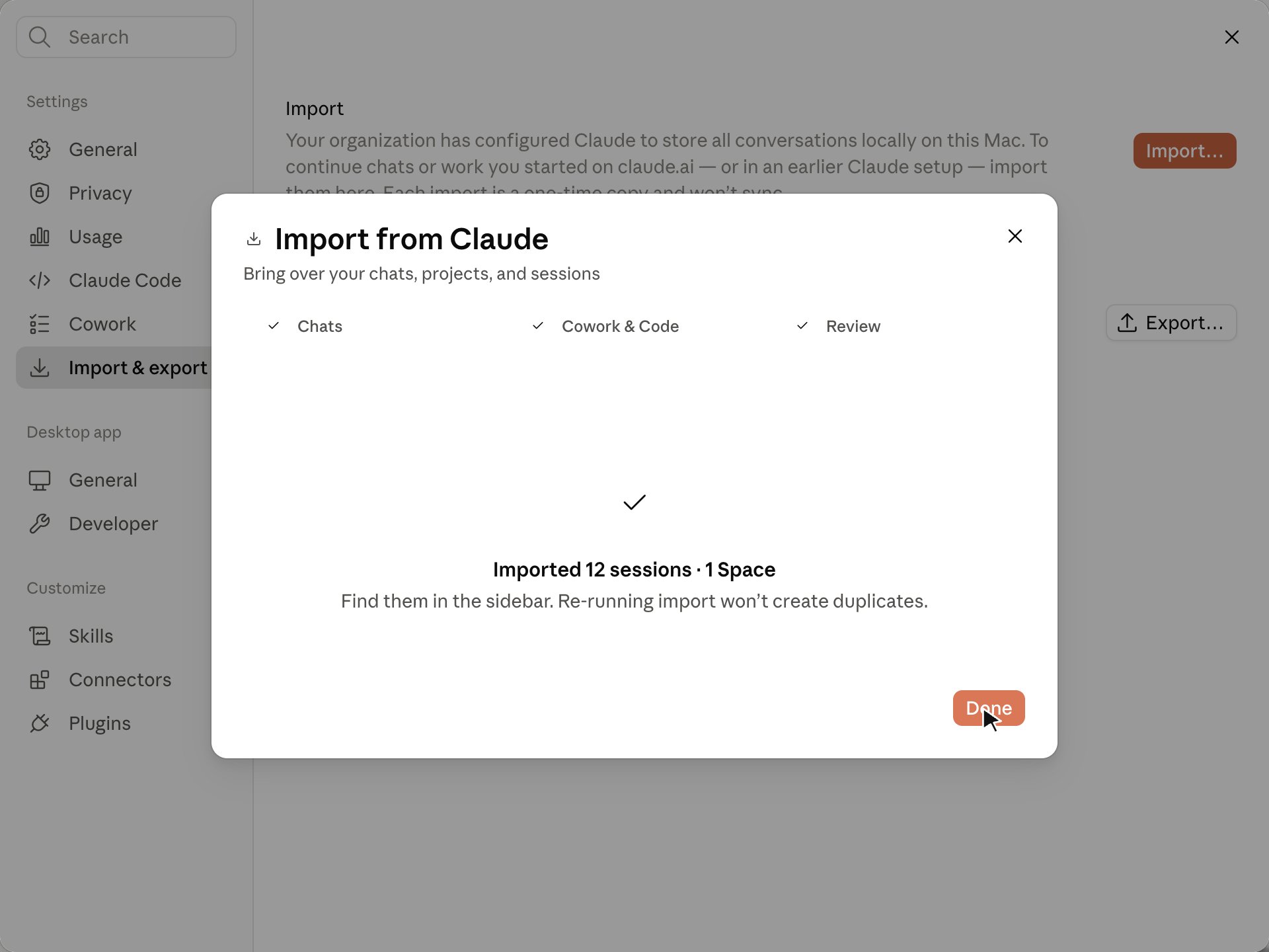 Import from Claude wizard success screen reading Imported 12 sessions and 1 Space, with a note that re-running import will not create duplicates.