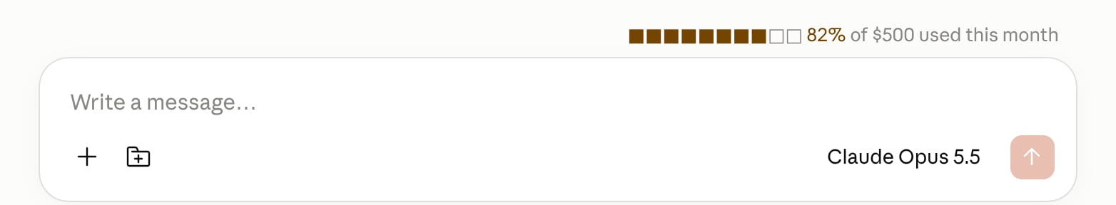 The Claude Desktop message box. Above it, right-aligned in small gray text, a ten-square bar and the words 82% of $500 used this month. The first eight squares and the 82% are colored.
