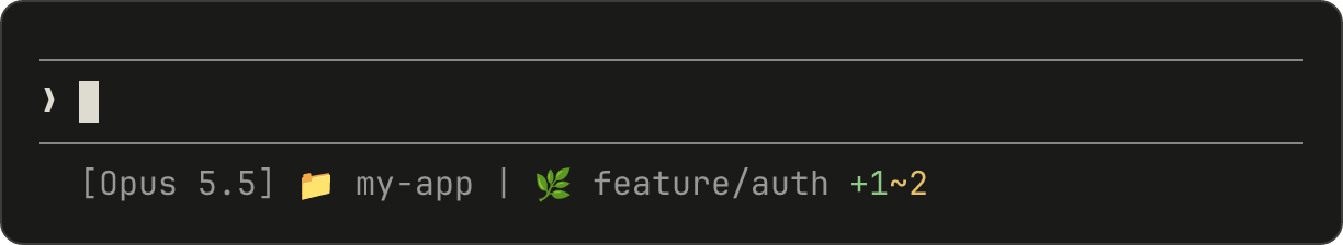 A status line showing model, directory, git branch, and colored indicators for staged and modified files