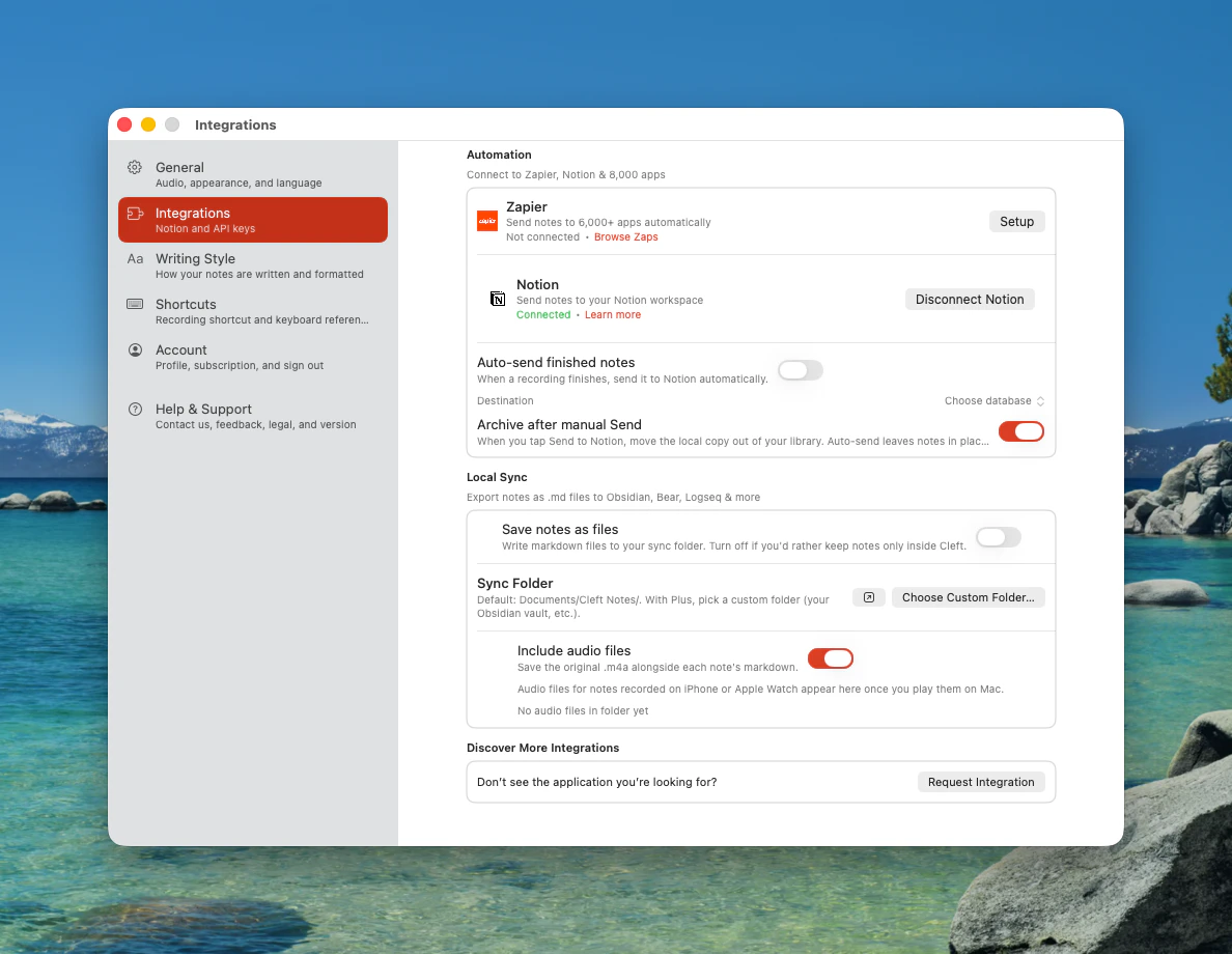 Cleft's Integrations settings on Mac. A labelled sidebar lists General, Integrations, Writing Style, Shortcuts, Account, and Help & Support. The pane shows Zapier and a connected Notion under Automation, then a Local Sync section with Save notes as files, a Sync Folder row with a reveal-in-Finder button and a Choose Custom Folder button, and an Include audio files toggle.