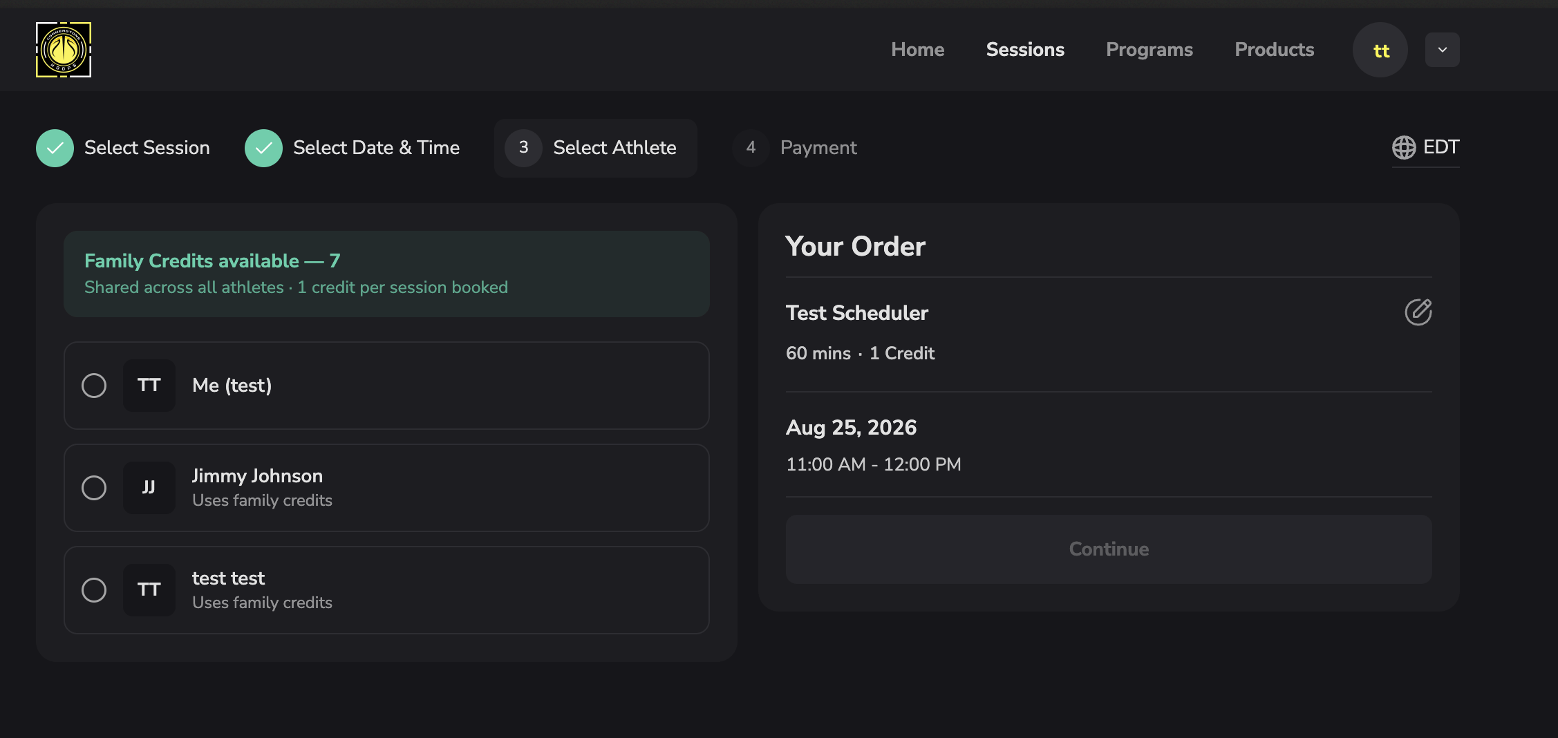 Select Athlete step in the booking flow, showing Family Credits available and a list of athletes to book for