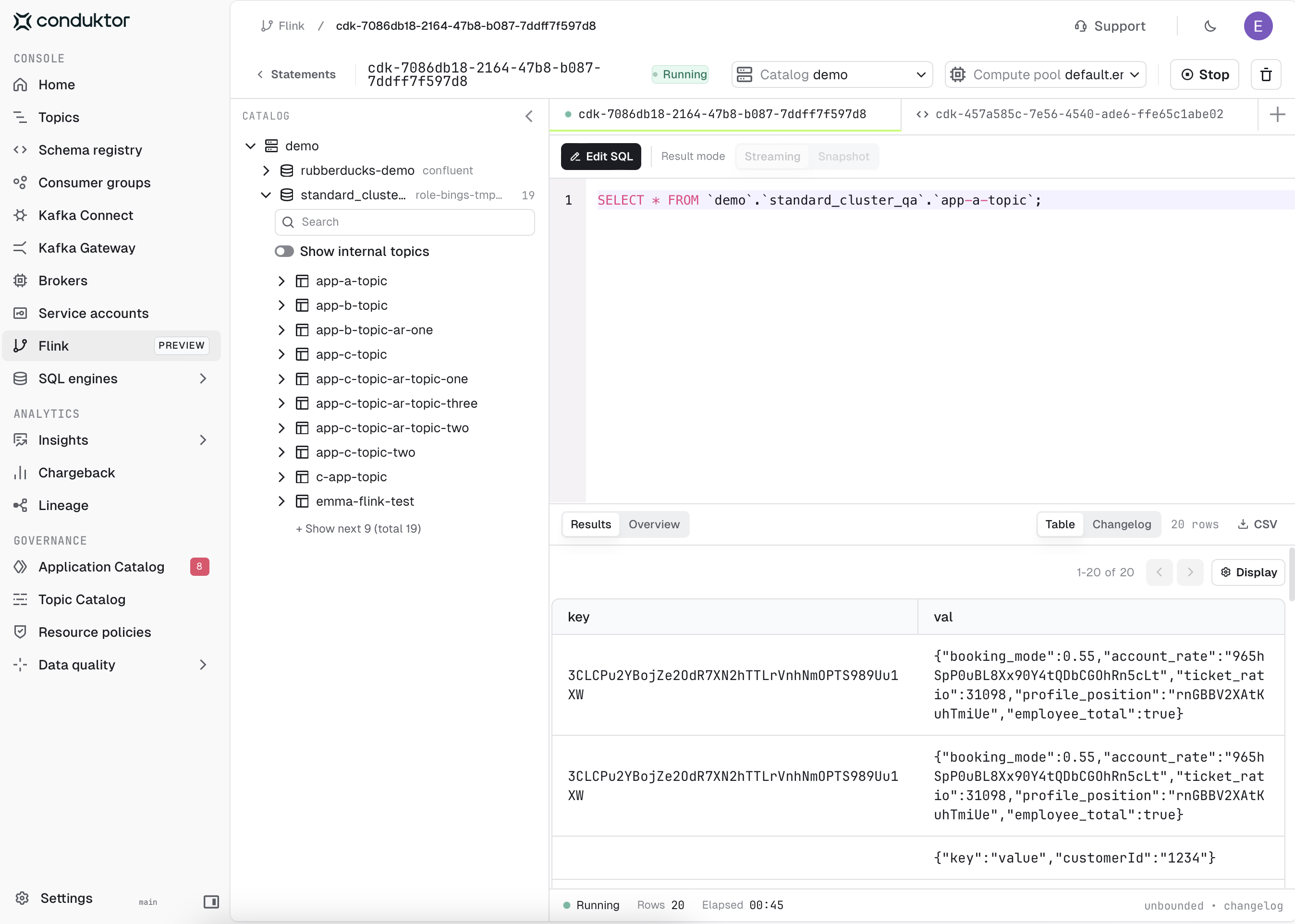 Flink SQL workbench running a statement, with the catalog browser and streaming results