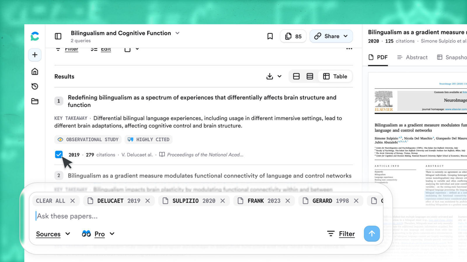 Search results with papers checked and attached as chips above the search bar