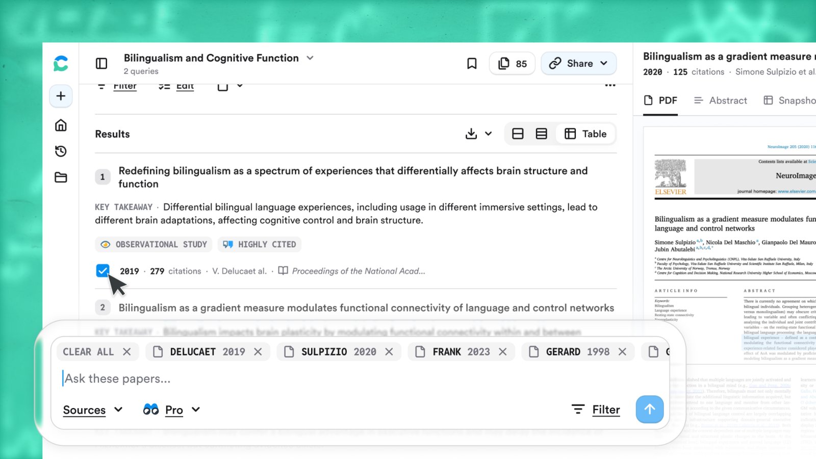 Search results with papers checked and attached as chips above the search bar