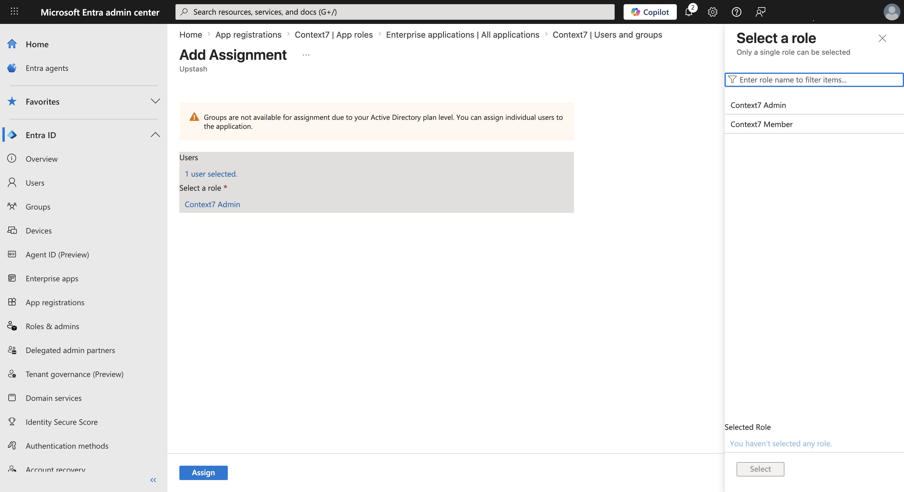 Assigning a user and selecting a role