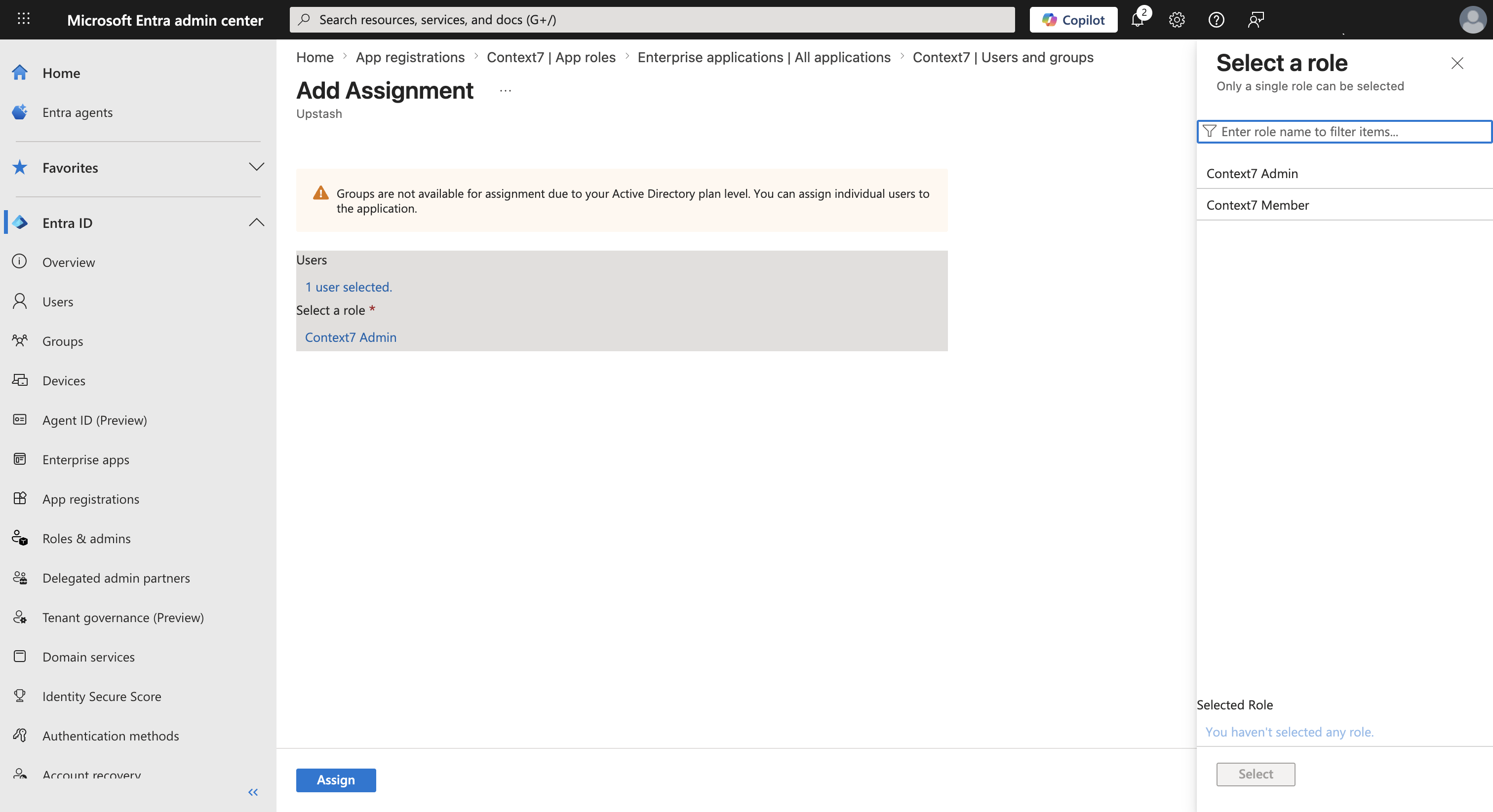 Assigning a user and selecting a role