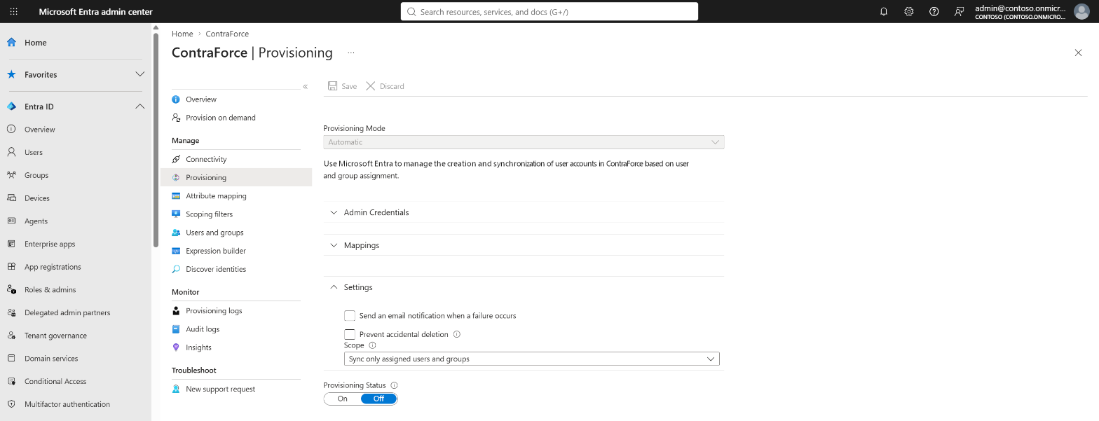 Provisioning page in Entra with Provisioning Mode Automatic and the Settings section expanded, showing the failure email and accidental deletion options, Scope set to Sync only assigned users and groups, and Provisioning Status