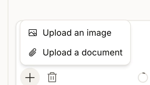 The attachment menu on the assistant's message box, offering Upload an image and Upload a document