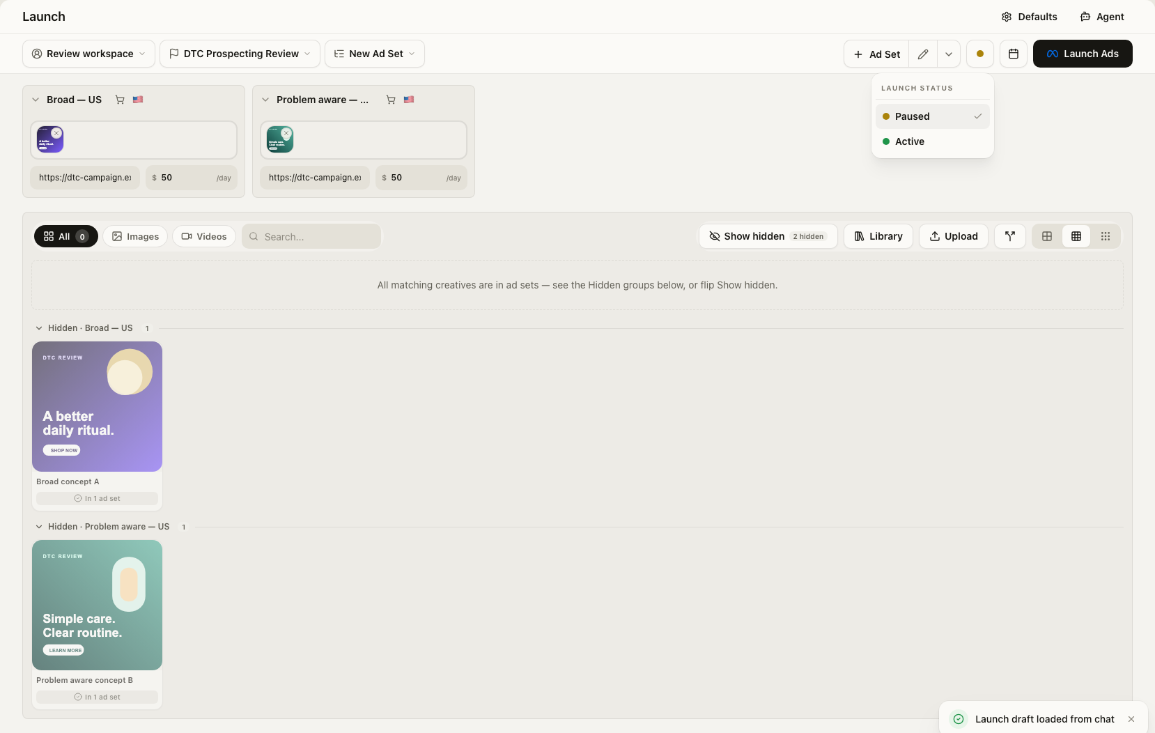 Reviewable Launch workspace with DTC Prospecting Review, Broad US and Problem aware US ad sets, two example creatives, a Launch draft loaded from chat notice and Paused selected in the Launch status menu