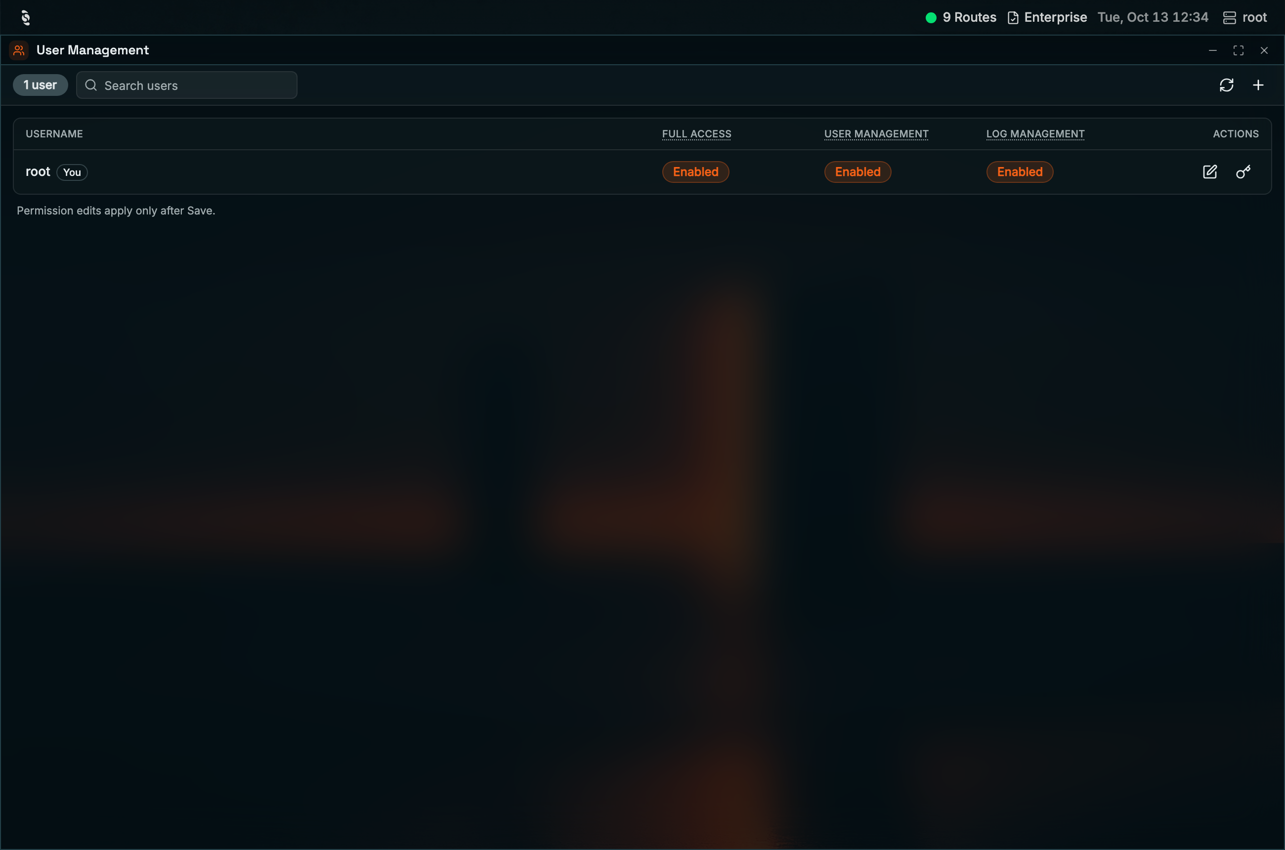 Coreflux HUB User Management window with a 1 user badge, Search users, refresh and add buttons, and a table listing root (You) with Full Access, User Management, and Log Management Enabled plus edit and change password actions, and the note Permission edits apply only after Save