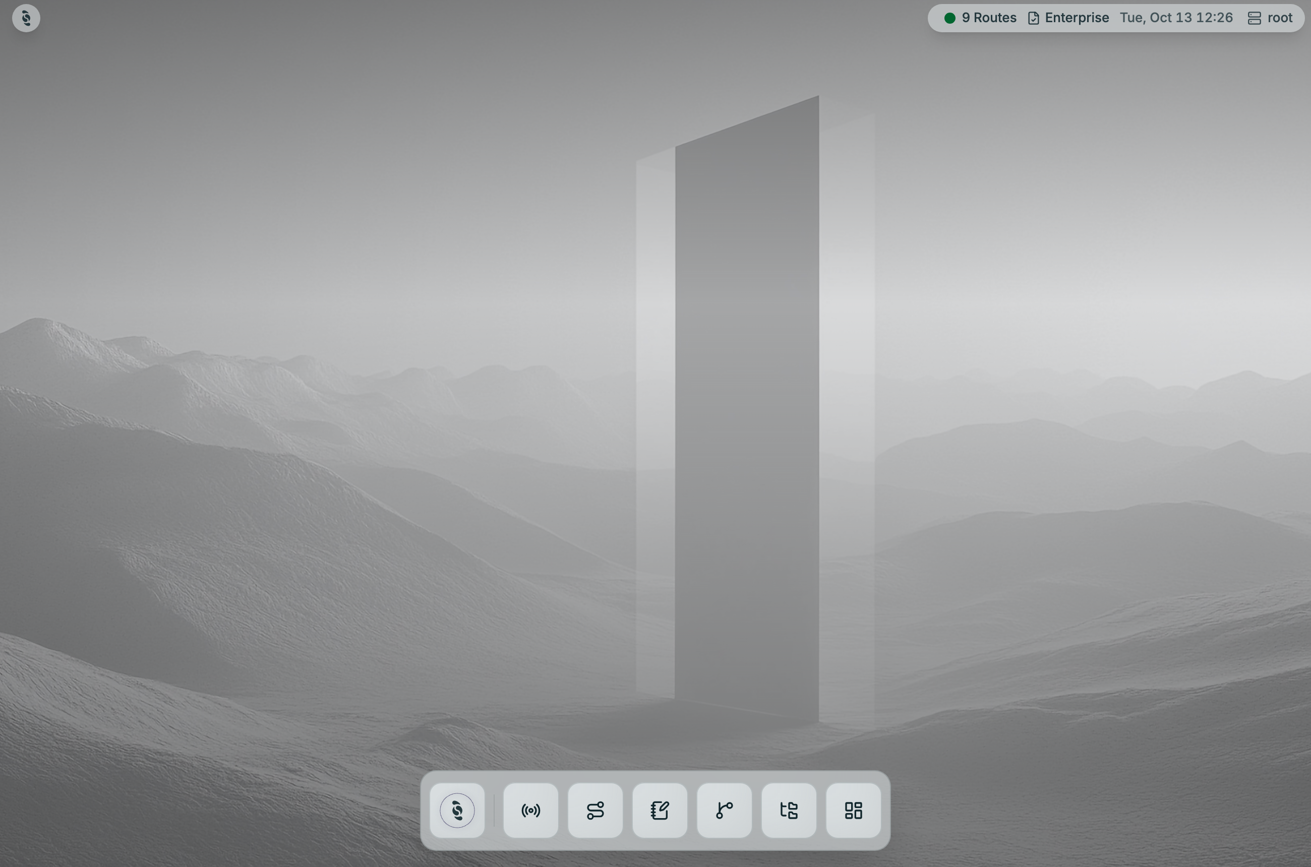 Coreflux HUB desktop with wallpaper, the top-right status bar showing 9 Routes, Enterprise, the date and time and the root broker menu, and the bottom dock with Coreflux AI, Data Viewer, Routes, LoT Editor, LoT Flow, UNS Viewer, and Dashboards