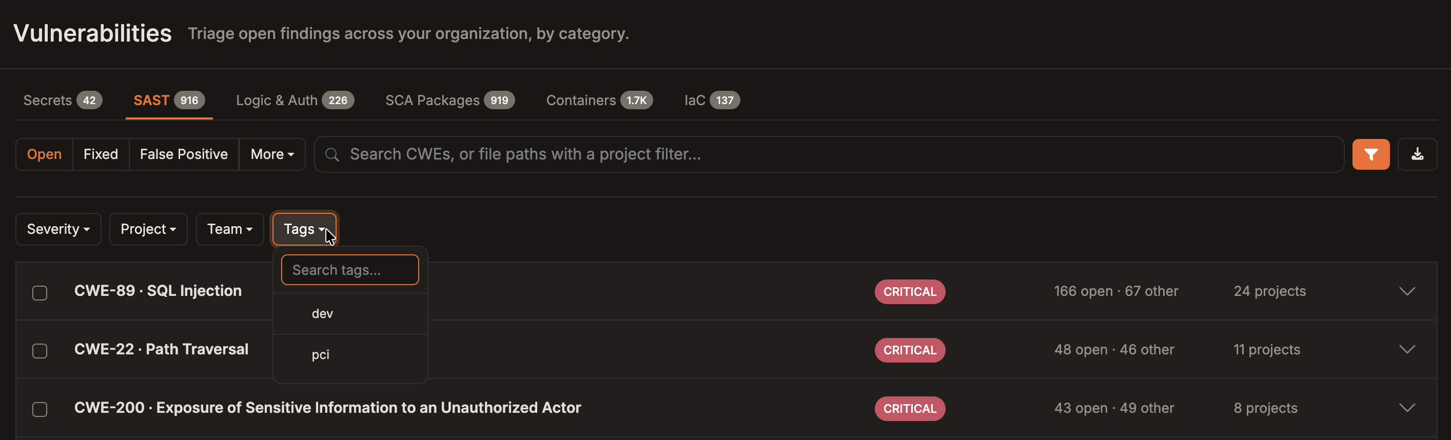 SAST tab with the filter row open and the Tags menu showing a tag search